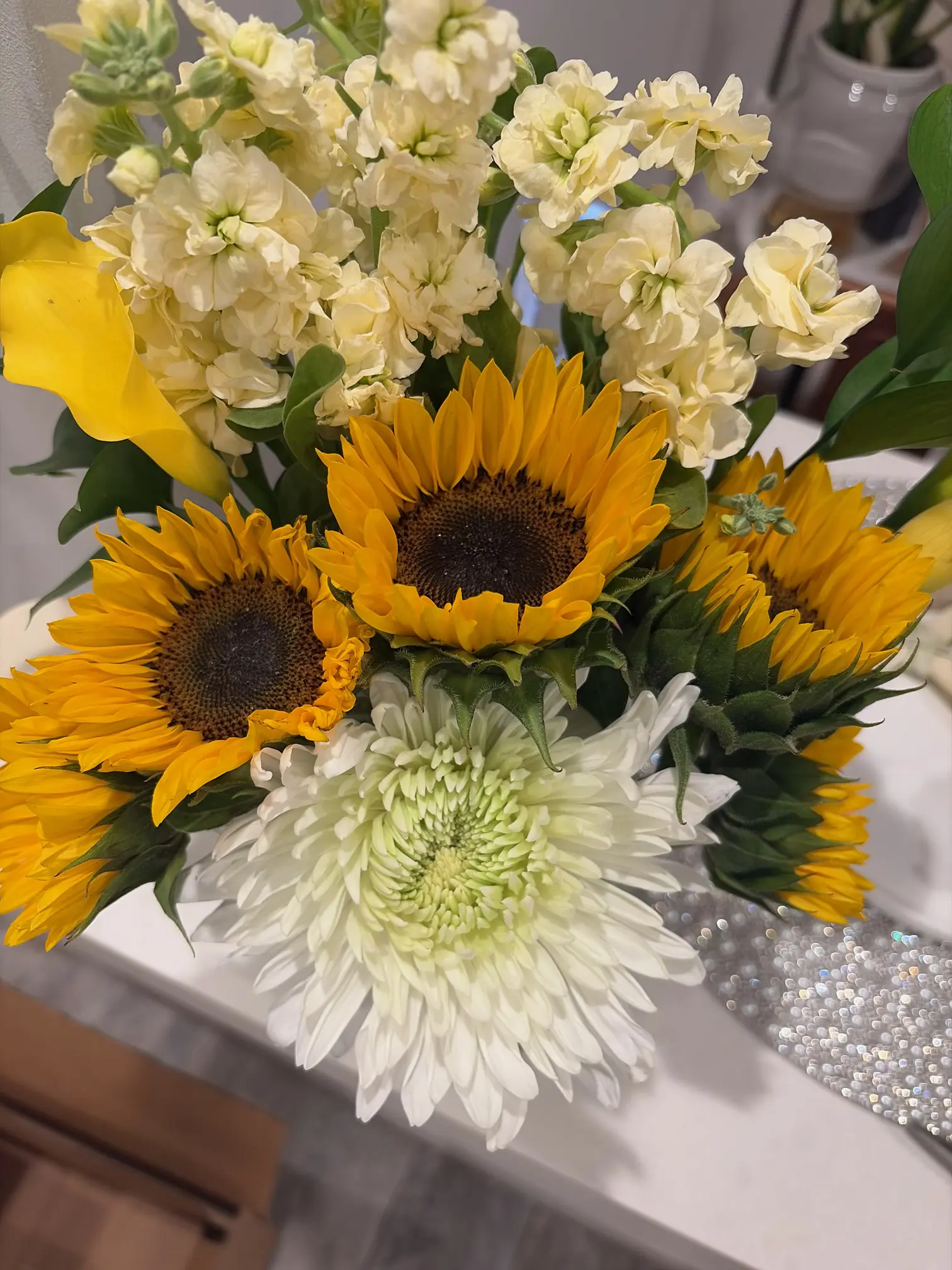 White sunflower floral centerpiece for a Wellington private dinner